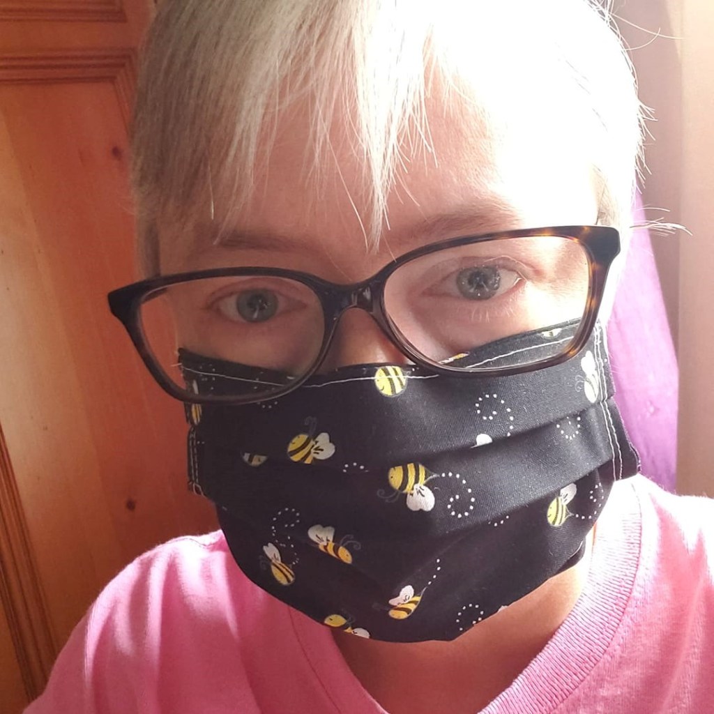 me wearing a honeybee design mask in quarantine