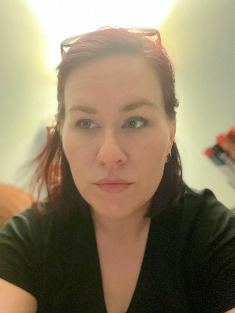 A headshot of the author, Morgan Reilly
